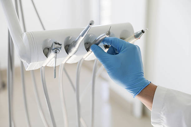 Professional Tooth Extraction technician working in Glen Carbon, IL